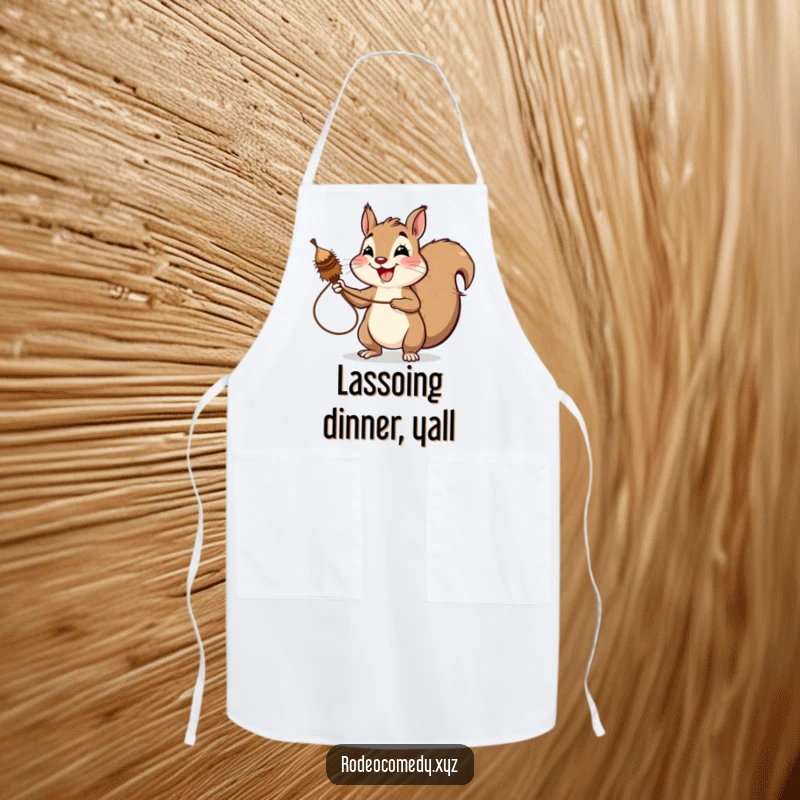 Funny squirrel apron, skillfully lassoing a spinning tumbleweed with a wide, triumphant grin. Perfect for kitchen fun.