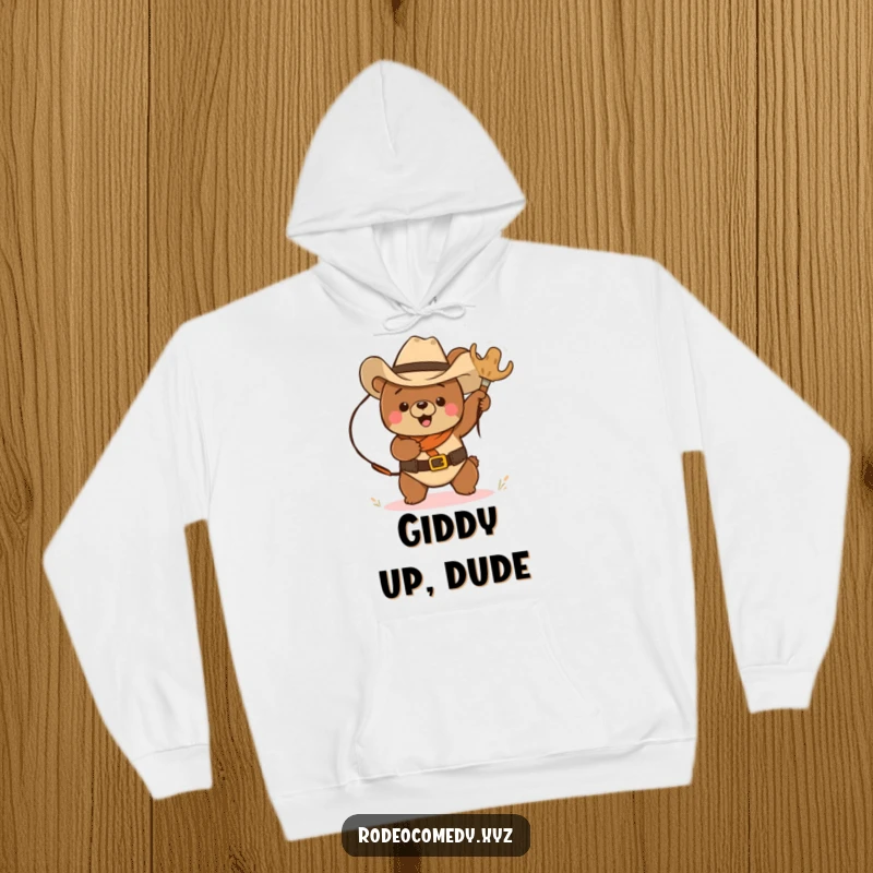 Funny cowboy bear in a hat, lassoing a tumbleweed, printed on a warm and comfortable hoodie, perfect for gift giving.
